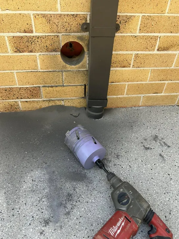 Downpipe connected down into the stormwater line at ground level