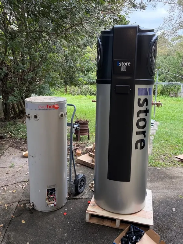 New iStore heat pump alongside the old cylinder it replaced
