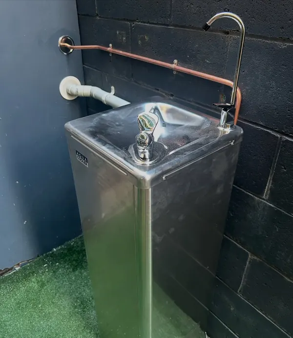 Stainless steel hot water cylinder installed with new copper pipework