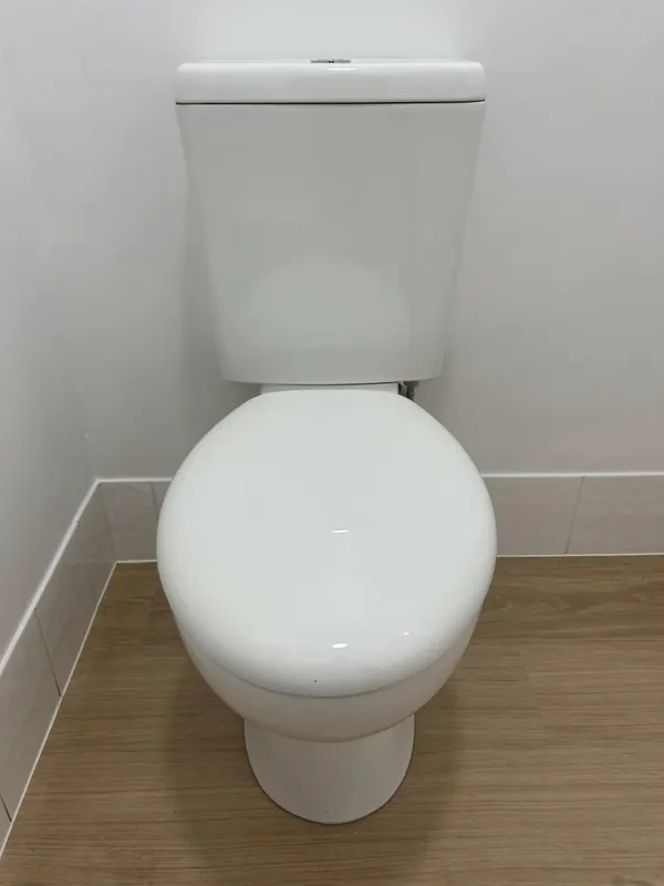New close-coupled toilet suite installed and connected